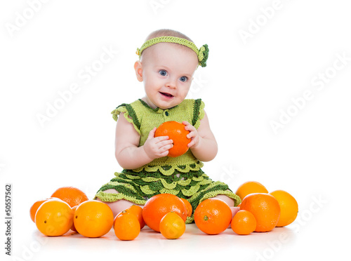 happy baby  girl with fruit...