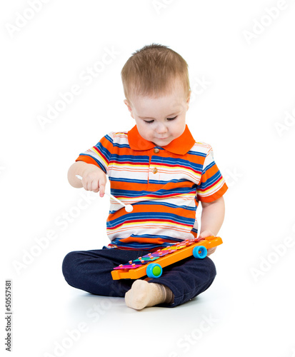 Funny kid playing  with mus...