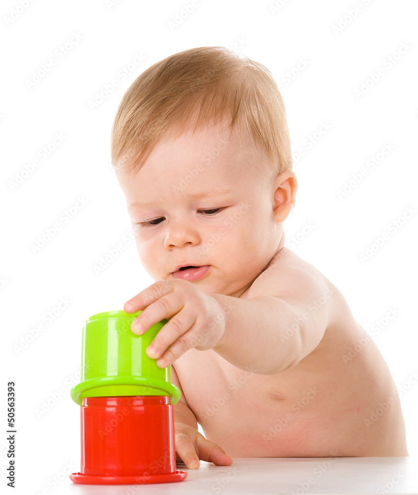 child playing with color pyramid toy. isolated on white child playing with color pyramid toy. isolated on white