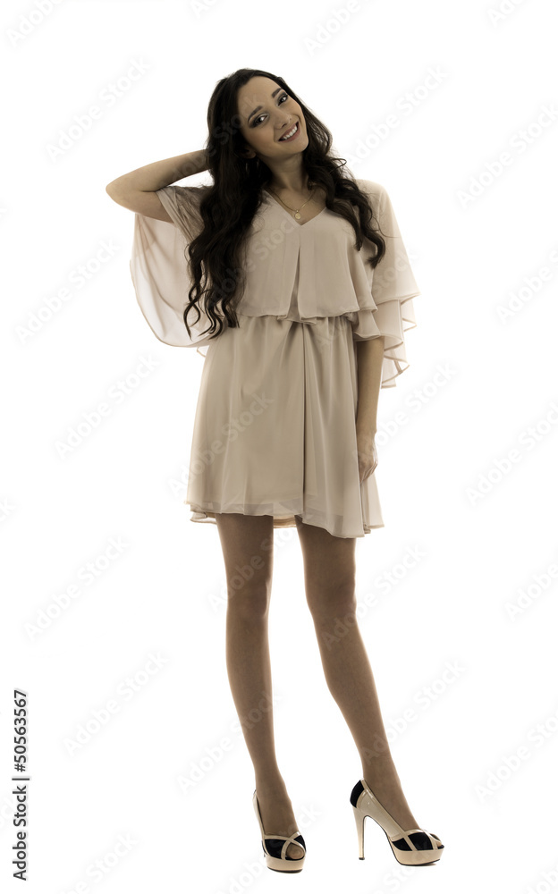 beautiful young woman posing in studio on white background beautiful young woman posing in studio on white background