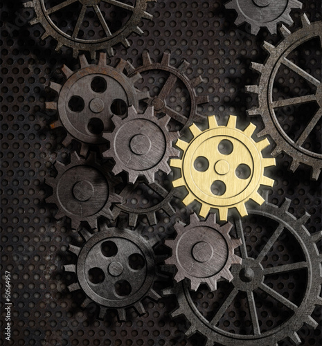 rusty gears and cogs with g...