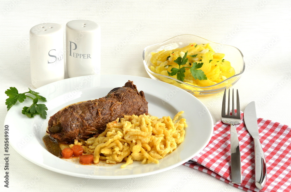Rinderroulade mit Spätzle und Kartoffelsalat Stock Photo | Adobe Stock