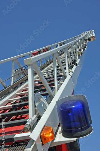 stair riser and blue truck Siren of firefighters during an emerg photo