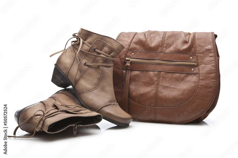 Pair of female shoes and handbag over white Pair of female shoes and handbag over white