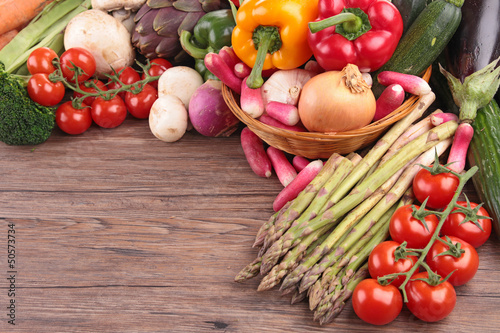 healthy organic vegetables on a wood background