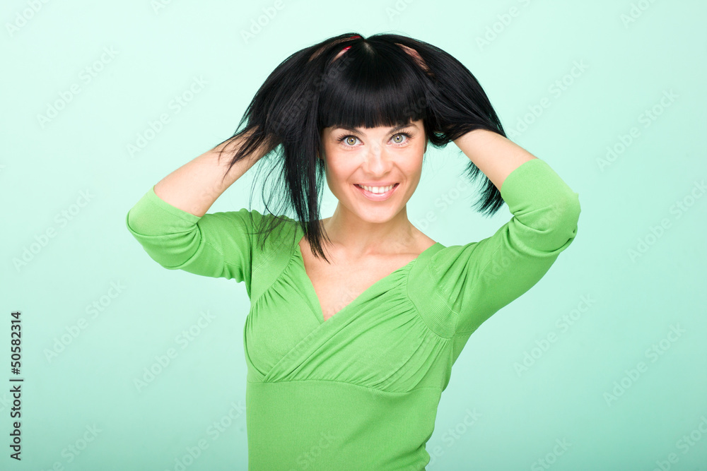 smiling woman on green background smiling woman on green background
