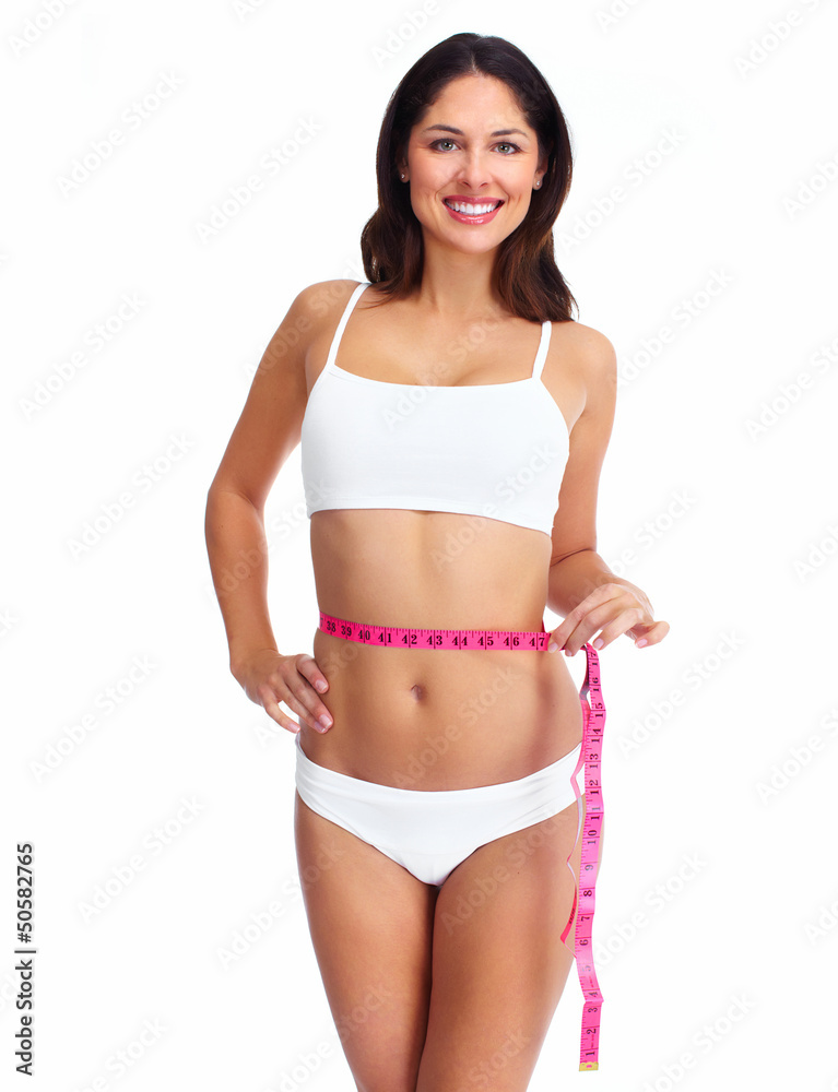 Fototapeta premium Beautiful healthy woman with a measuring tape.