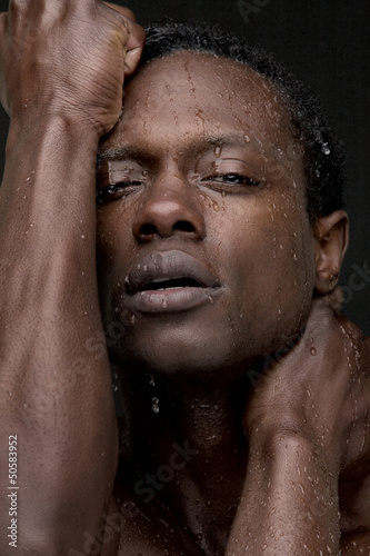Sexy African American Man with Water on Face