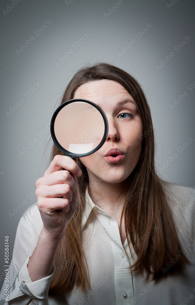 Woman with magnifier