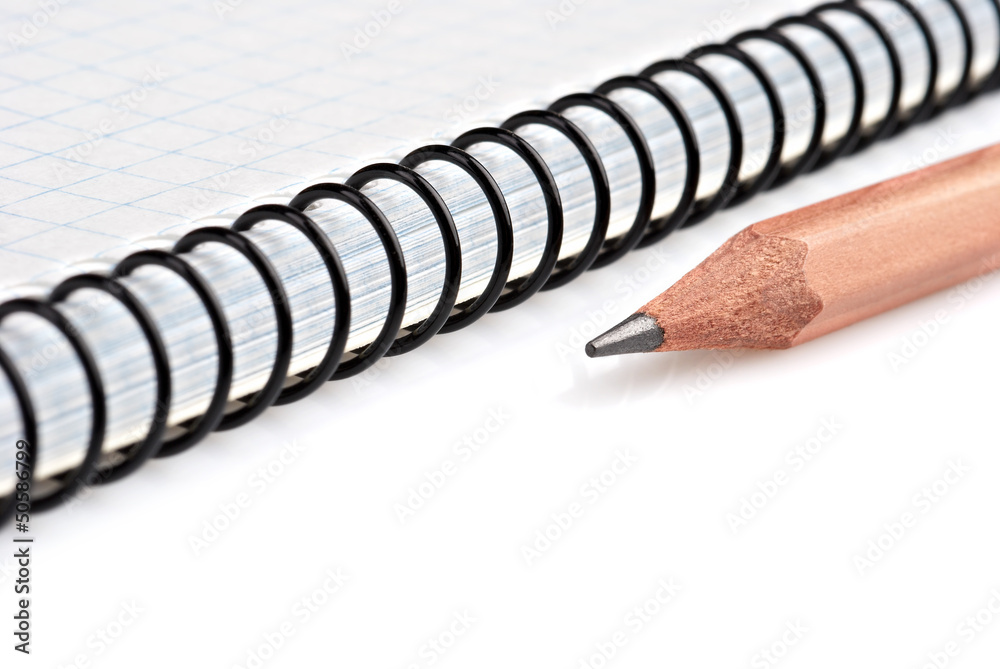 Close-up pencil on spiral notebook Close-up pencil on spiral notebook