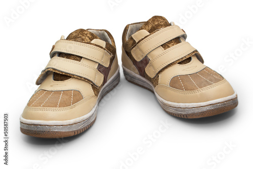 old children beige shoes with Velcro sneakers isolated on white