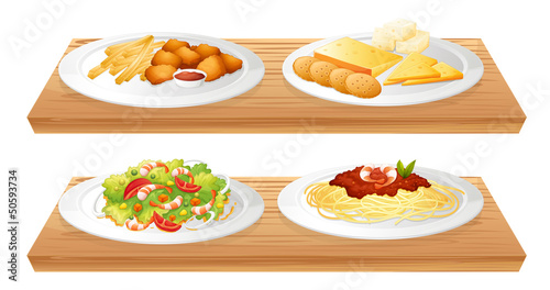 Two wooden trays with four plates full of foods