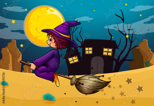 A witch riding in her broom