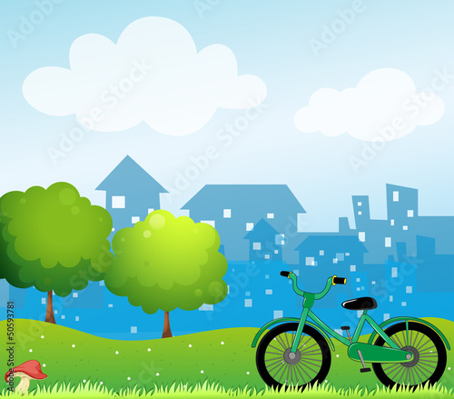 A bicycle in front of the village