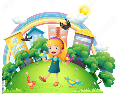 A young girl with a lot of birds