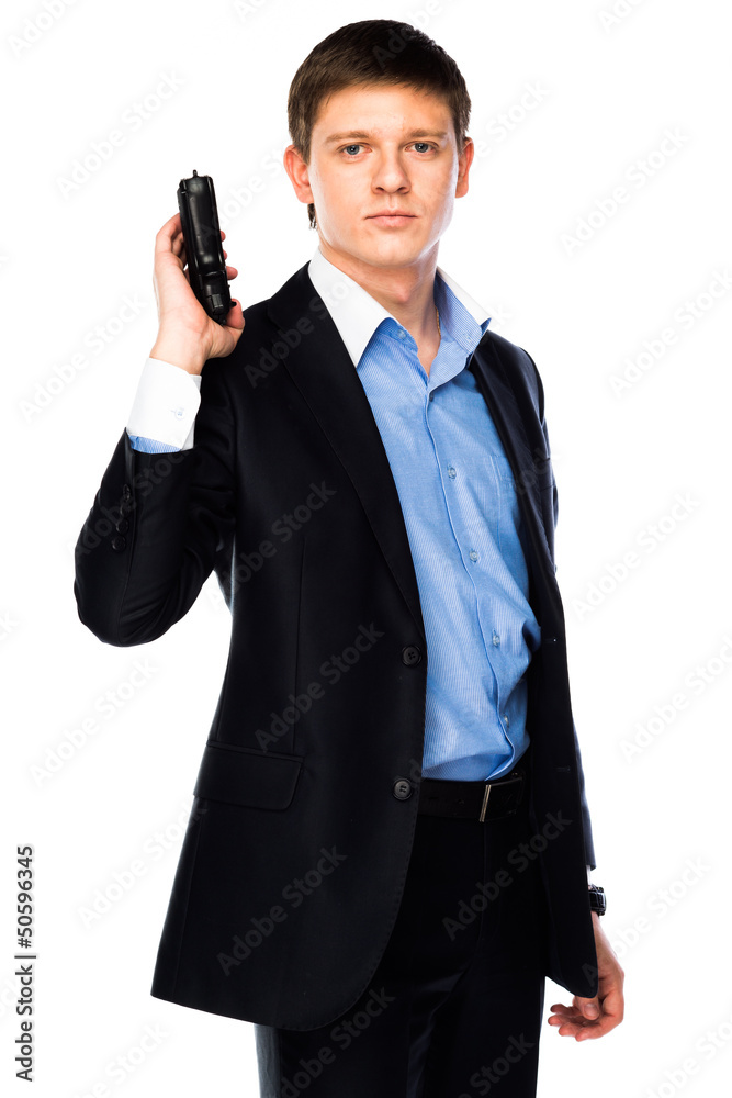 young and handsome man with a gun in his hand young and handsome man with a gun in his hand