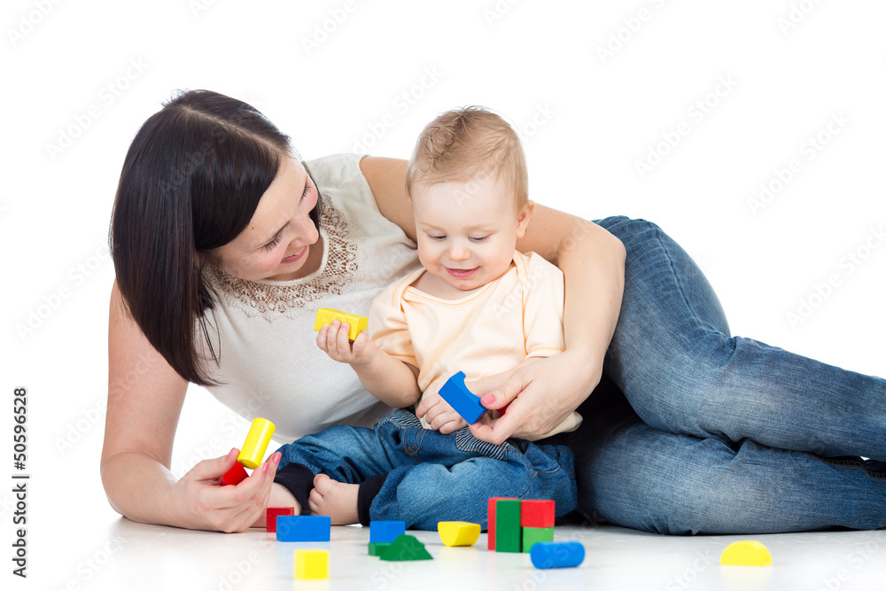 baby boy and mother playing together with construction set toy baby boy and mother playing together with construction set toy