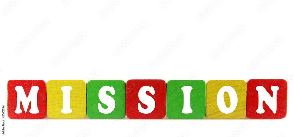 mission - isolated text in wooden building blocks mission - isolated text in wooden building blocks