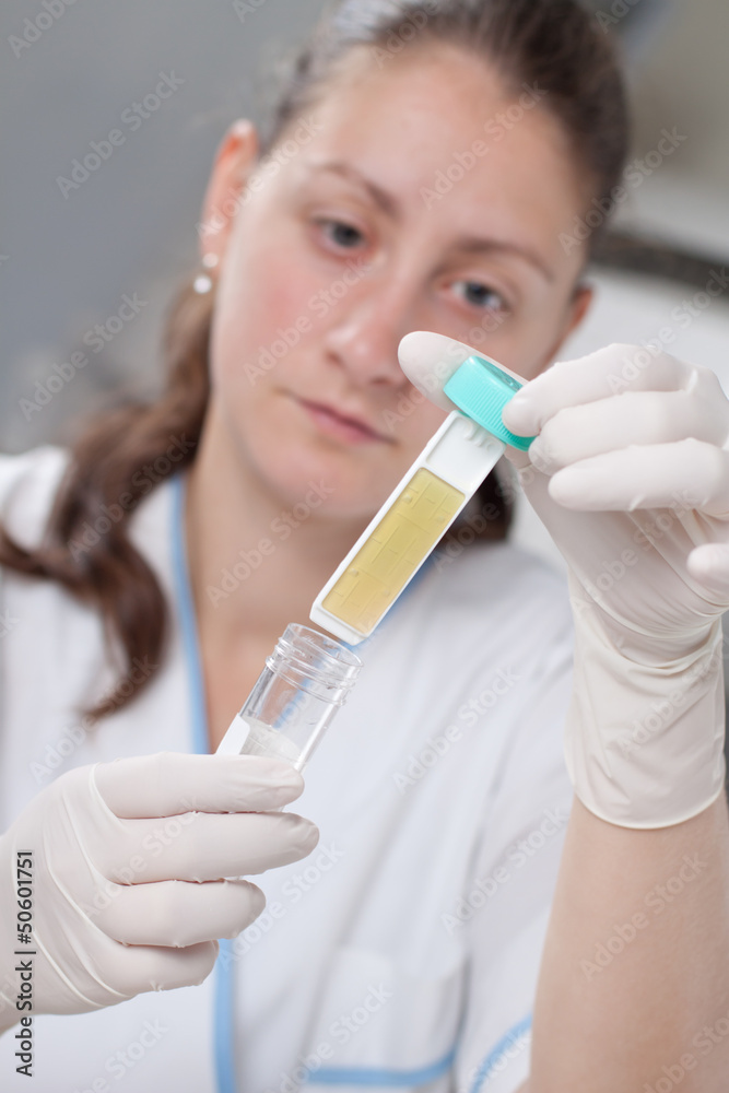 Lab scientist with petri dish Lab scientist with petri dish