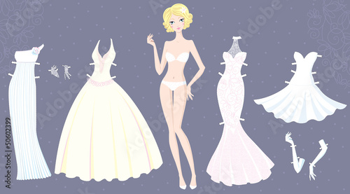 Paper doll of cute girl with wedding dresses photo