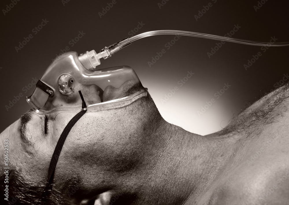 Man in mask of oxygen.
