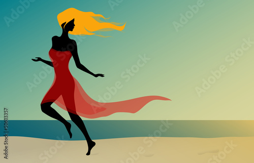 Beautiful sexy girl running on the sunshine beach
