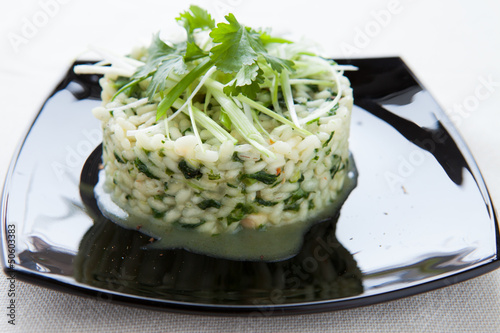 delicious risotto with spinach and chopped greens