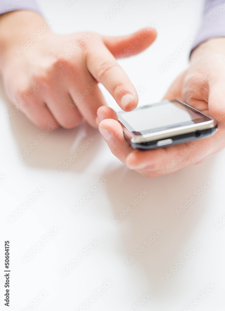 Man holding a mobile phone Man holding a mobile phone