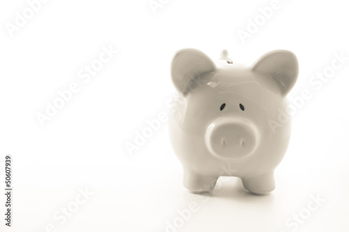 White piggy bank with copy space