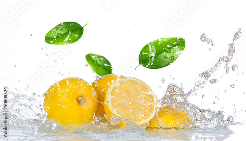 Lemon with water splash isolated on white