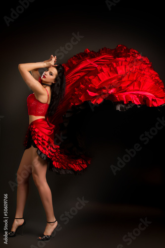 lady in gypsy costume dancing flamenco