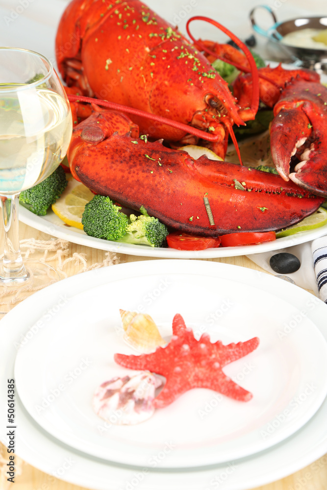 Red lobster on platter on serving table close-up Red lobster on platter on serving table close-up