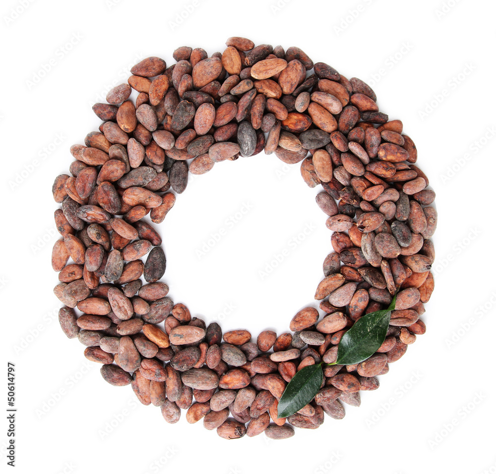 Cocoa beans with leaves isolated on white Cocoa beans with leaves isolated on white