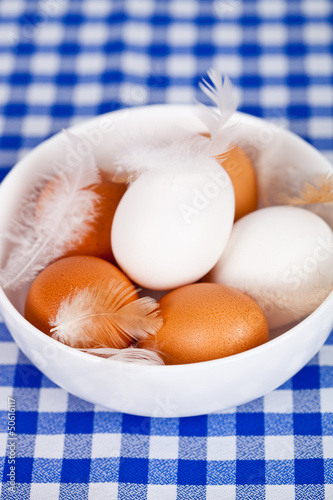 brown and white eggs photo