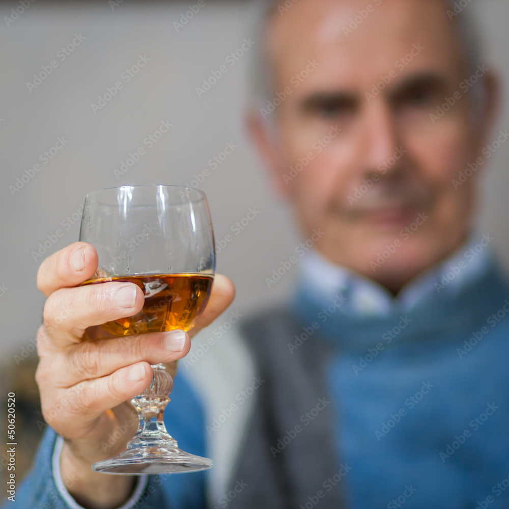 Old man making a toast(drinking)