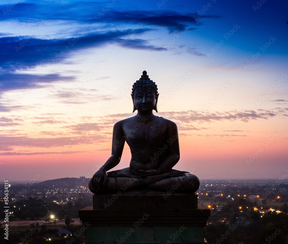 Buddha statue in sunset Buddha statue in sunset