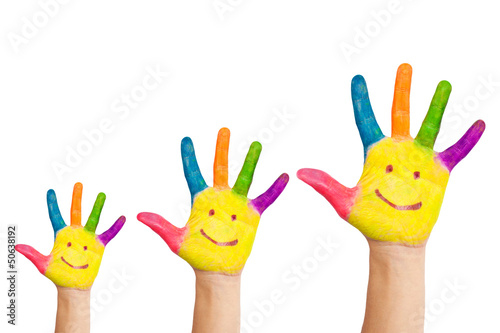 Three colorful painted hands of mother, father, baby