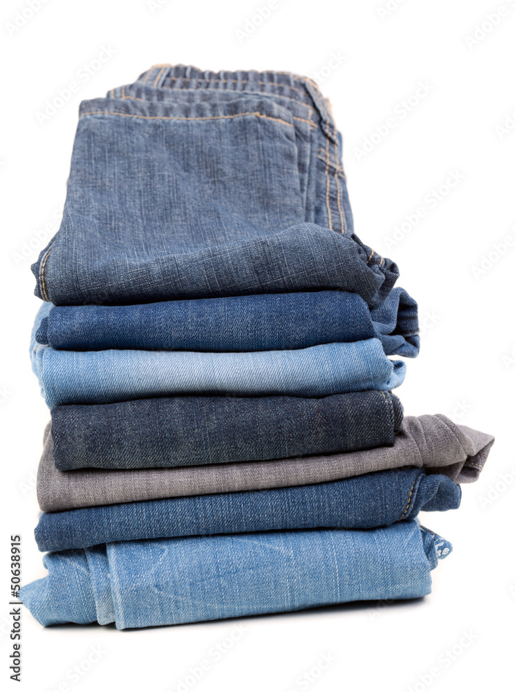 Stack of jeans isolated on white background Stack of jeans isolated on white background
