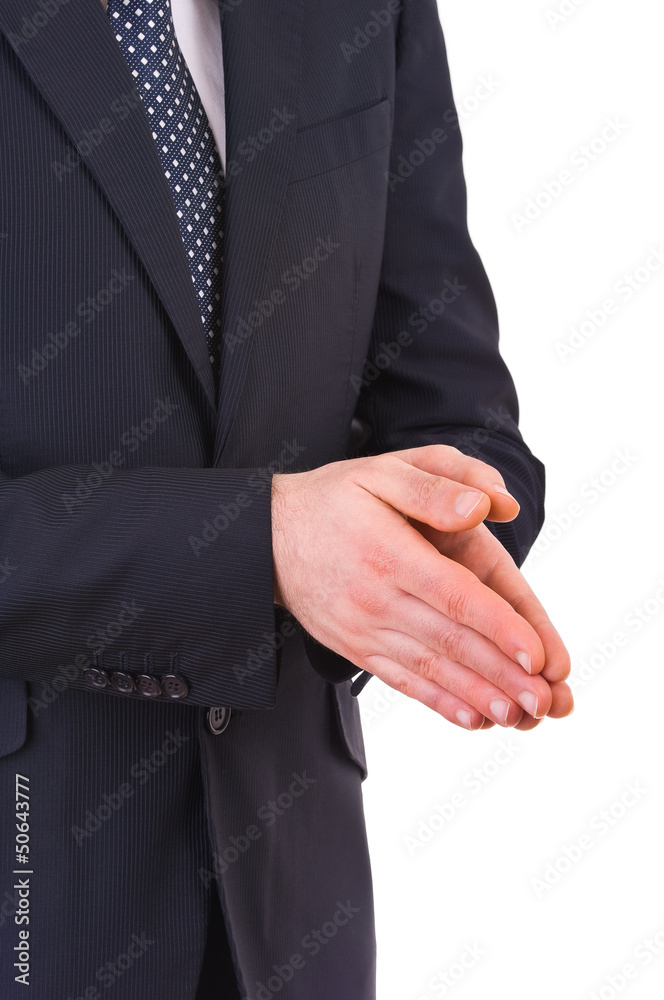 Businessman rubbing his hands together.