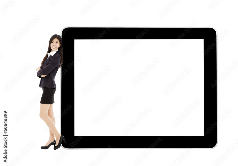 young businesswoman standing with tablet and blank screen young businesswoman standing with tablet and blank screen