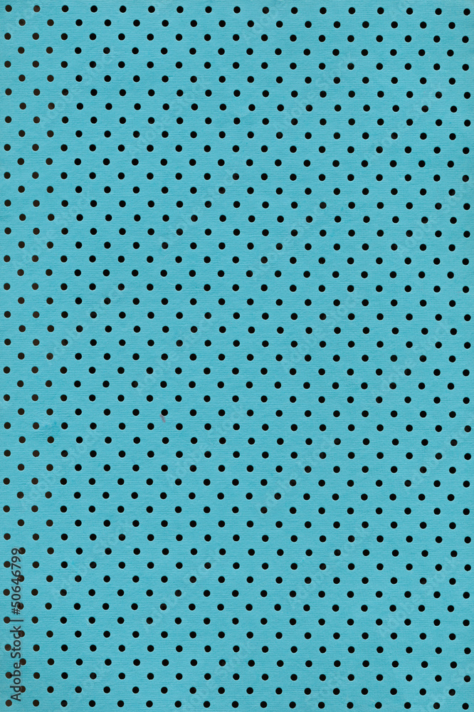 Cyan paper background with polka dot pattern