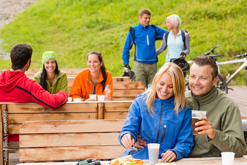 Friends having fun rest area drinking refreshments