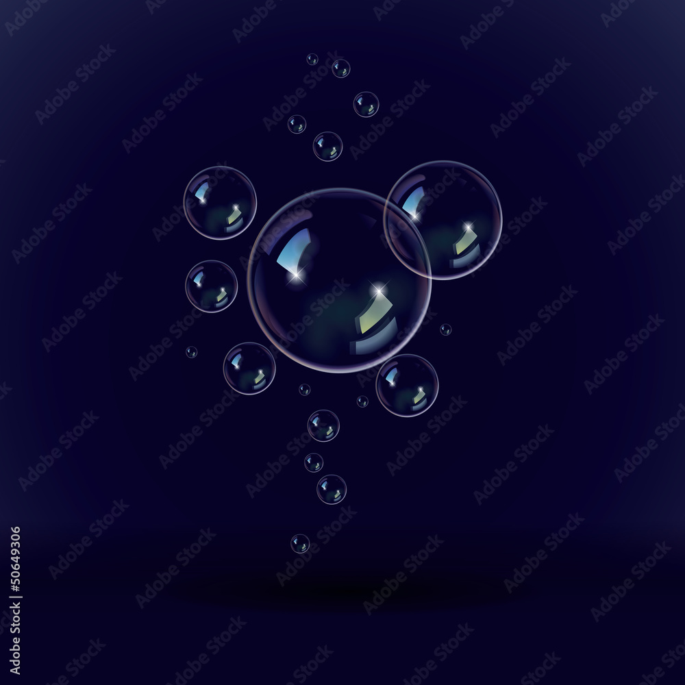 Soap bubbles on a black blue background