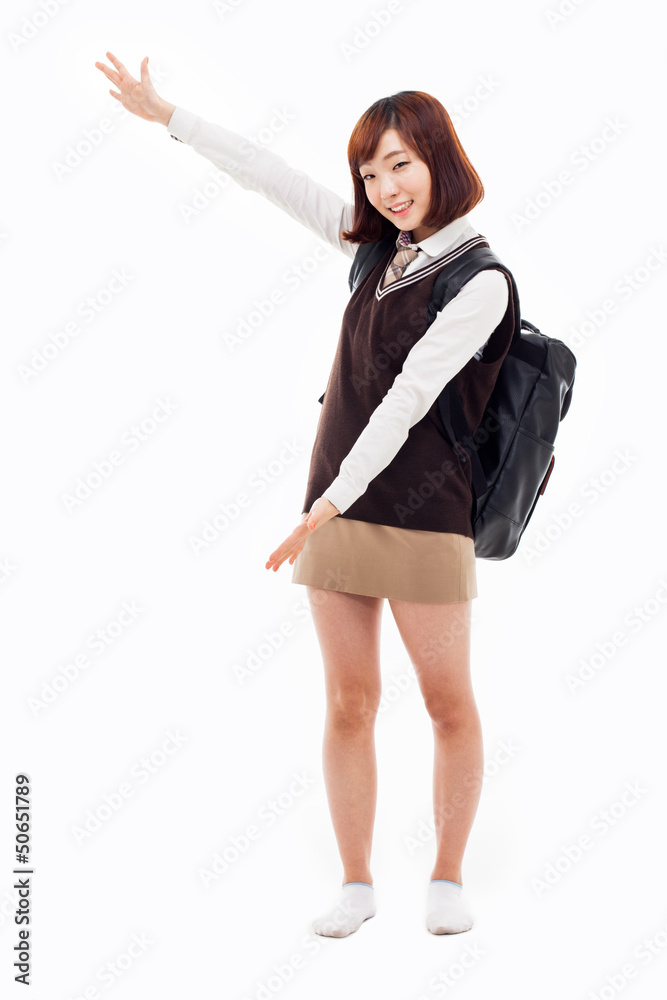 Young pretty Asian student indicate side space Young pretty Asian student indicate side space