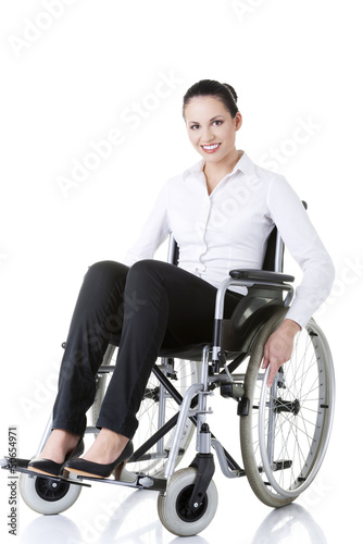 Attractive smiling disabled businesswoman