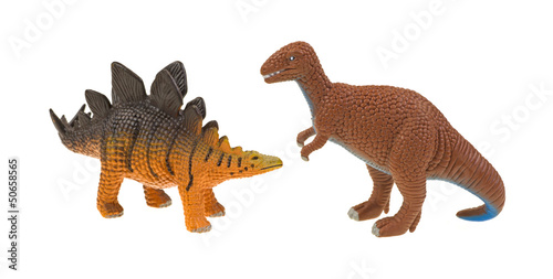 Plastic stegosaurus and tyrannosaurus
