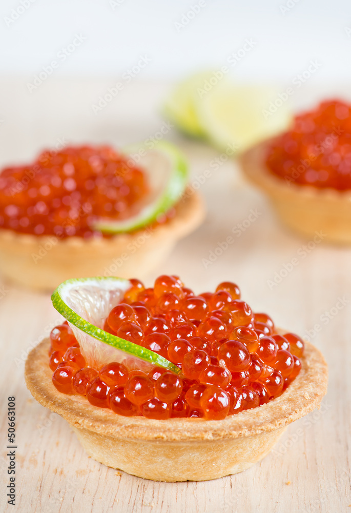Tartlets with red caviar and lime Tartlets with red caviar and lime