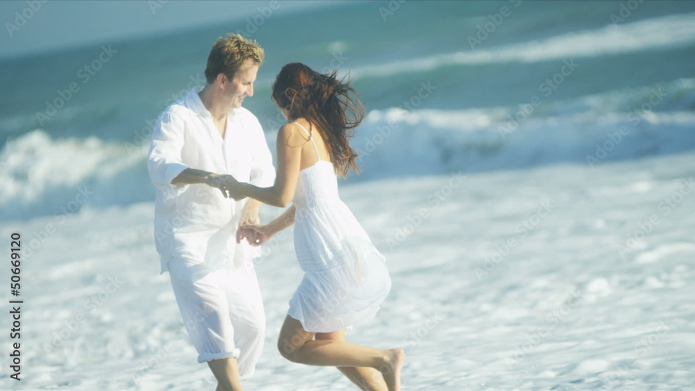 Attractive Couple Fun Enjoying Outdoor Beach Lifestyle Attractive Couple Fun Enjoying Outdoor Beach Lifestyle