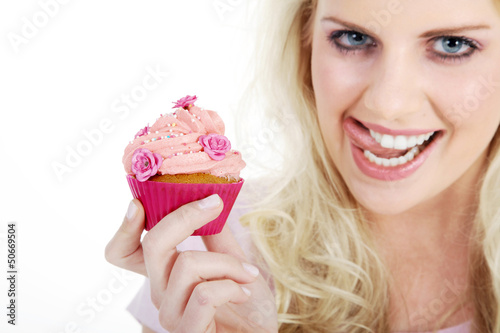 Model Gesicht Frau mit Cupcake Nahaufnahme