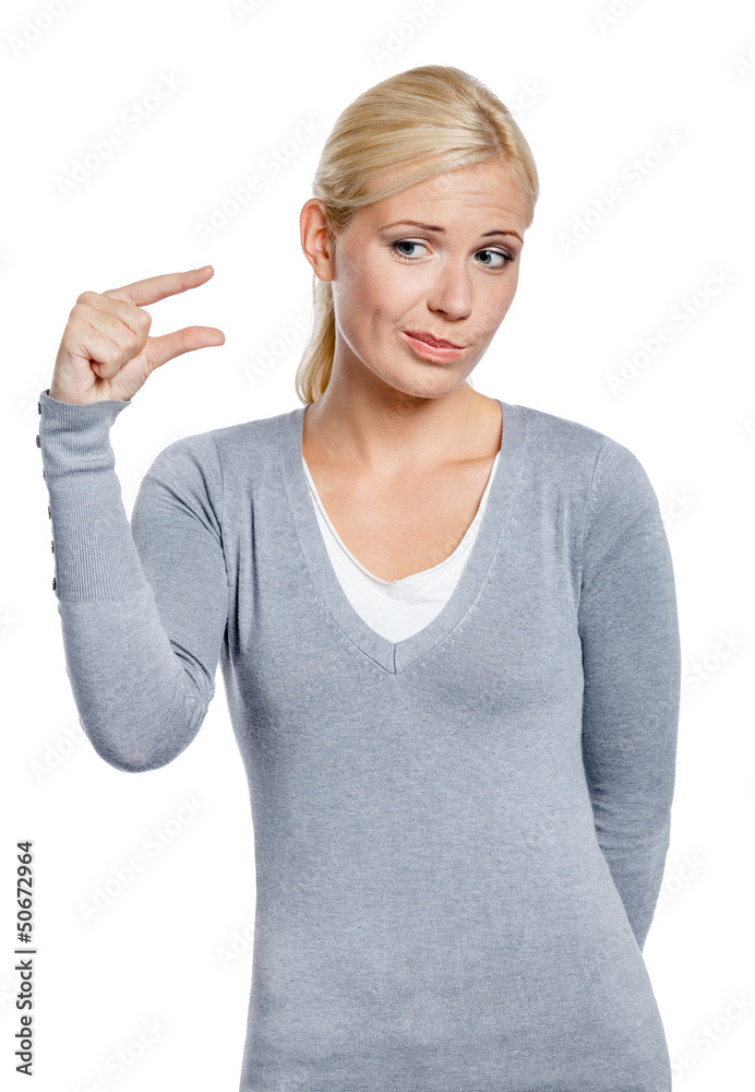 Girl showing small amount of something with fingers Girl showing small amount of something with fingers